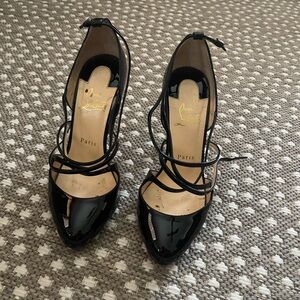 Louboutin Thin Strap Criss Cross stiletto. Black patent leather. Size 38